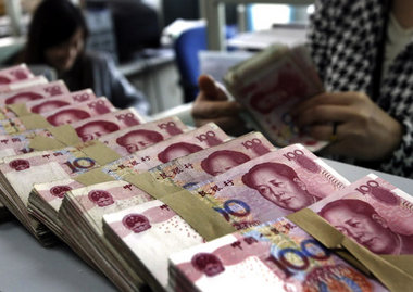 Hundert-Yuan-Scheine in der Bank - derzeit wirkt China wie ein H... Hundert-Yuan-Scheine in der Bank - derzeit wirkt China wie ein H...