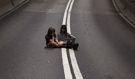 Nomadische User, hier als Straßenblockierer in Hong Kong, im Okt...