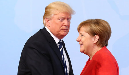 Personalisierter Interessenkonflikt: Donald Trump und Angela Mer...