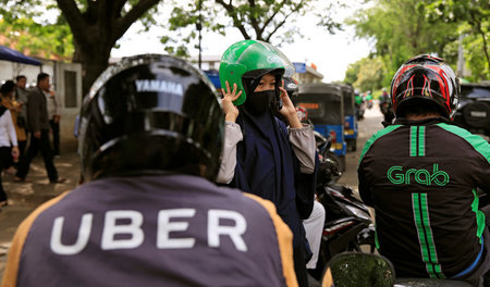 Machen in Südostasien zukünftig gemeinsame Sache: Uber und Grab ...