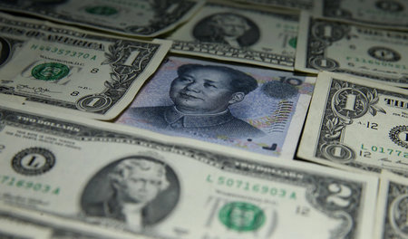 Die chinesische »Volksbank« will den Yuan-Dollar-Kurs stabil hal...