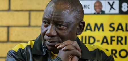 Südafrikas Präsident Cyril Ramaphosa vor einer Wahlkampfkundgebu...