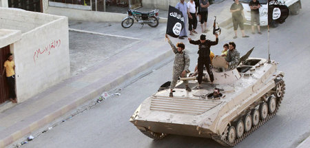 Inzwischen besiegt: Dschihadisten im Juni 2014 im syrischen Rakk...
