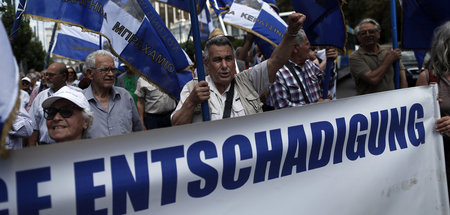 Forderung nach Entschädigung: Demonstranten auf dem Weg zur deut...