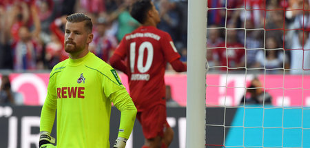 Einer macht den Unterschied: Kölns Torwart Timo Horn, hinten Cou...