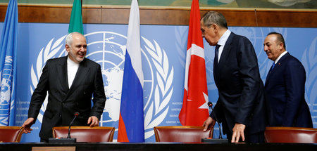 Die Außenminister der Türkei, Russlands und des Iran (von rechts...