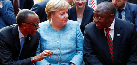 Kanzlerin Merkel mit den Staatschefs von Ruanda und Südafrika, P...