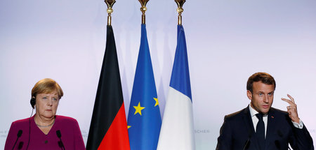 Bundeskanzlerin Angela Merkel und Frankreichs Präsident Emmanuel...
