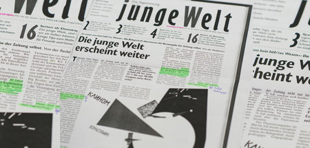 jW-Titelseite nach dem Konkurs 1995 mit der Grafik »Mit dem rote...