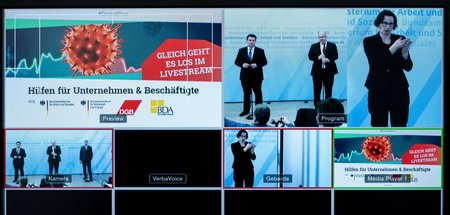 Die Bundesregierung fährt groß auf, um den Lohnabhängigen ihre m...