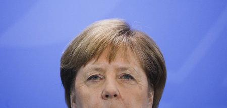 Bundeskanzlerin Angela Merkel (CDU) blickt weit über den Tellerr... Bundeskanzlerin Angela Merkel (CDU) blickt weit über den Tellerr...