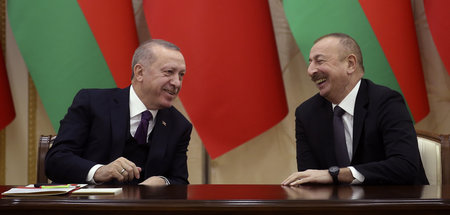 Haben gut lachen: Der türkische Präsident Recep Tayyip Erdogan u... Haben gut lachen: Der türkische Präsident Recep Tayyip Erdogan u...