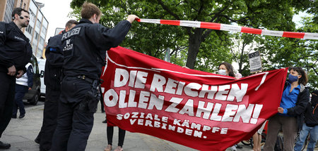Ob man sie zu den Villenvierteln durchlässt? Demonstranten forde...