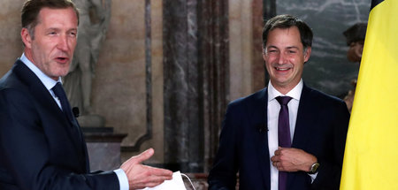 Noch zuversichtlich: Sozialdemokrat Paul Magnette (l.) und der d...