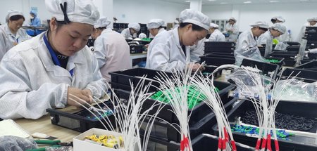 Die Krise hinter sich gelassen: Arbeiterinnen im chinesischen Me...