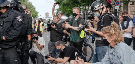 Pressefotografen und Handybesitzer in Berlin