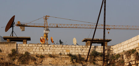 Das Recht auf eine Wohnung ist in Syrien geschützt: Baustelle in...