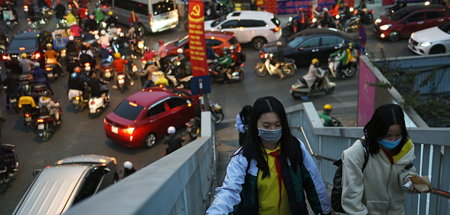 Pandemie unter Kontrolle: Straßenszene in der vietnamesischen Ha...