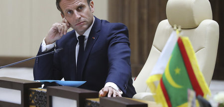 Der französische Staatspräsident Emmanuel Macron zu Besuch auf e...