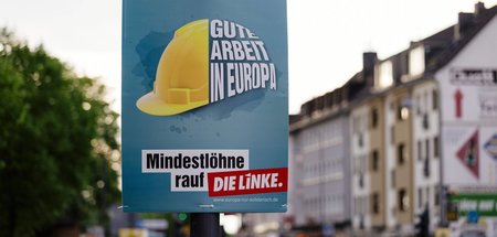 Linke-Wahlplakat im Kölner Stadtteil Ehrenfeld vor der EU-Parlam...