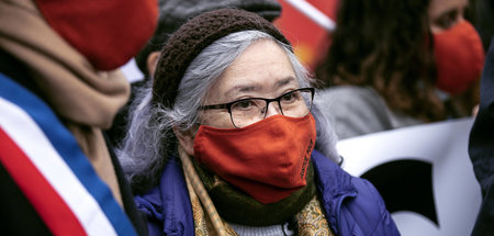 Die Klägerin Tran To Nga während einer Demonstration am 30. Janu...