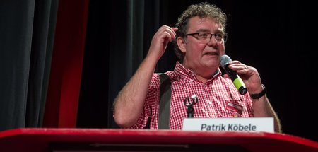 Der DKP-Vorsitzende Patrik Koebele am 9. Januar 2016 auf der Int...