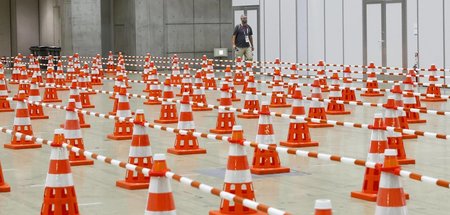 Zum PCR-Test bitte hier entlang: Pressezentrum in Tokio
