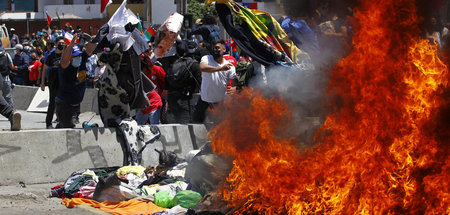 Lagerfeuer: Zeltlager von migrierenden Venezolanern in Chile ang...