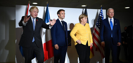 Nicht sehr vertrauensvoll: Johnson (Großbritannien), Macron (Fra...