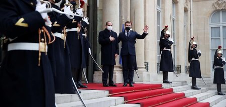 Warum der triumphale Empfang? Frankreichs Präsident Emmanuel Mac...