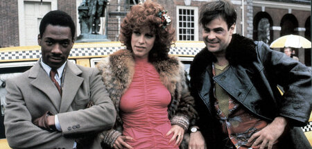 Jamie Lee Curtis (M.) mit Dan Aykroyd (r.) und Eddie Murphy (l.)...