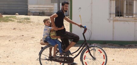 Vielleicht bald mit Rückkehrperspektive: Syrische Flüchtlinge im... Vielleicht bald mit Rückkehrperspektive: Syrische Flüchtlinge im...