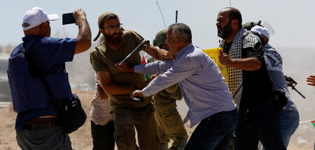 Streit um Land. Palästinensische Bewohner im Konflikt mit israel...