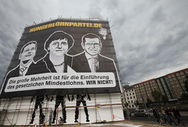Wahlplakat in Berlin: Nicht nur beim Mindestlohn droht unter Sch...