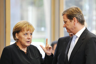 Tiefschwarze Agenda: Bundeskanzlerin Merkel (CDU) und FDP-Chef W... Tiefschwarze Agenda: Bundeskanzlerin Merkel (CDU) und FDP-Chef W...