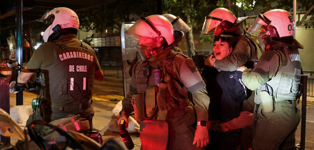 2025-12-15T013721Z_660331937_RC2PGIAAYCT8_RTRMADP_3_CHILE-ELECTI