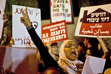 Eine arabische Demonstrantin am Samstag in Tel Aviv