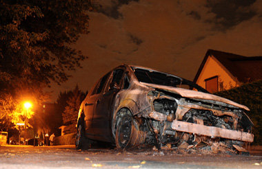 Ausgebrannter Opel in Berlin-Lichtenberg im August 2011