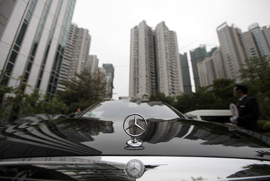 Straßenszene in der Metropole Guangzhou: Nicht nur fü... Straßenszene in der Metropole Guangzhou: Nicht nur fü...