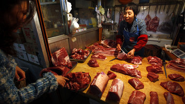 Kleinh&auml;ndler in Peking. Ab August sollen viele in den Genu&...