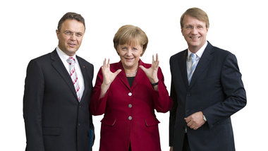 Grinsen f&uuml;r Big Brother: Hans-Peter Friedrich, Angela Merke...