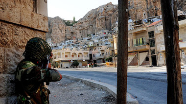 Ein syrischer Soldat am 11. September 2013 bei der Rückeroberung...