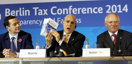 Der britische Finanzminister Geroge Osborne, OECD-Generalsekretä...