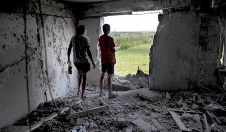 Unter Beschuss: Bewohner eines durch die ukrainische Armee zerst...