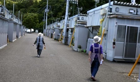 Tausende Japaner leben seit der Fukushima-Katastrophe in proviso... Tausende Japaner leben seit der Fukushima-Katastrophe in proviso...