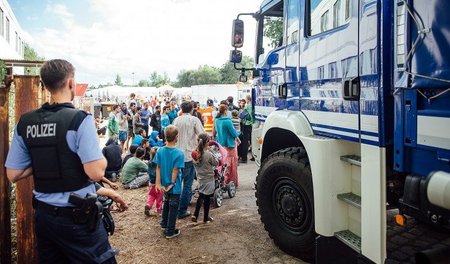 Sitzblockade im Camp: Flüchtlinge prangerten am 29. Juli die Zus...