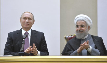 Gegenseitiger Beifall: Der russische Präsident Wladimir Putin un...