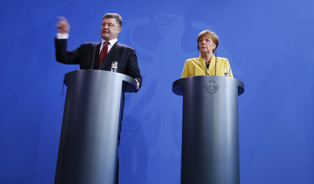 Berlin, 16. März 2015: Petro Poroschenko und Angela Merkel nach ...