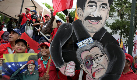 Demonstration am 1. Mai in Caracas: Maduro gegen Oppositionsführ... Demonstration am 1. Mai in Caracas: Maduro gegen Oppositionsführ...