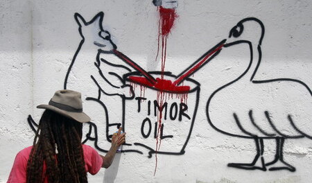 Protest-Graffiti an der australischen Botschaft in Dili, der Hau... Protest-Graffiti an der australischen Botschaft in Dili, der Hau...